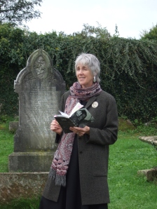 Jean reading 'The Crow House' in the graveyard at Wigtown Book Festival